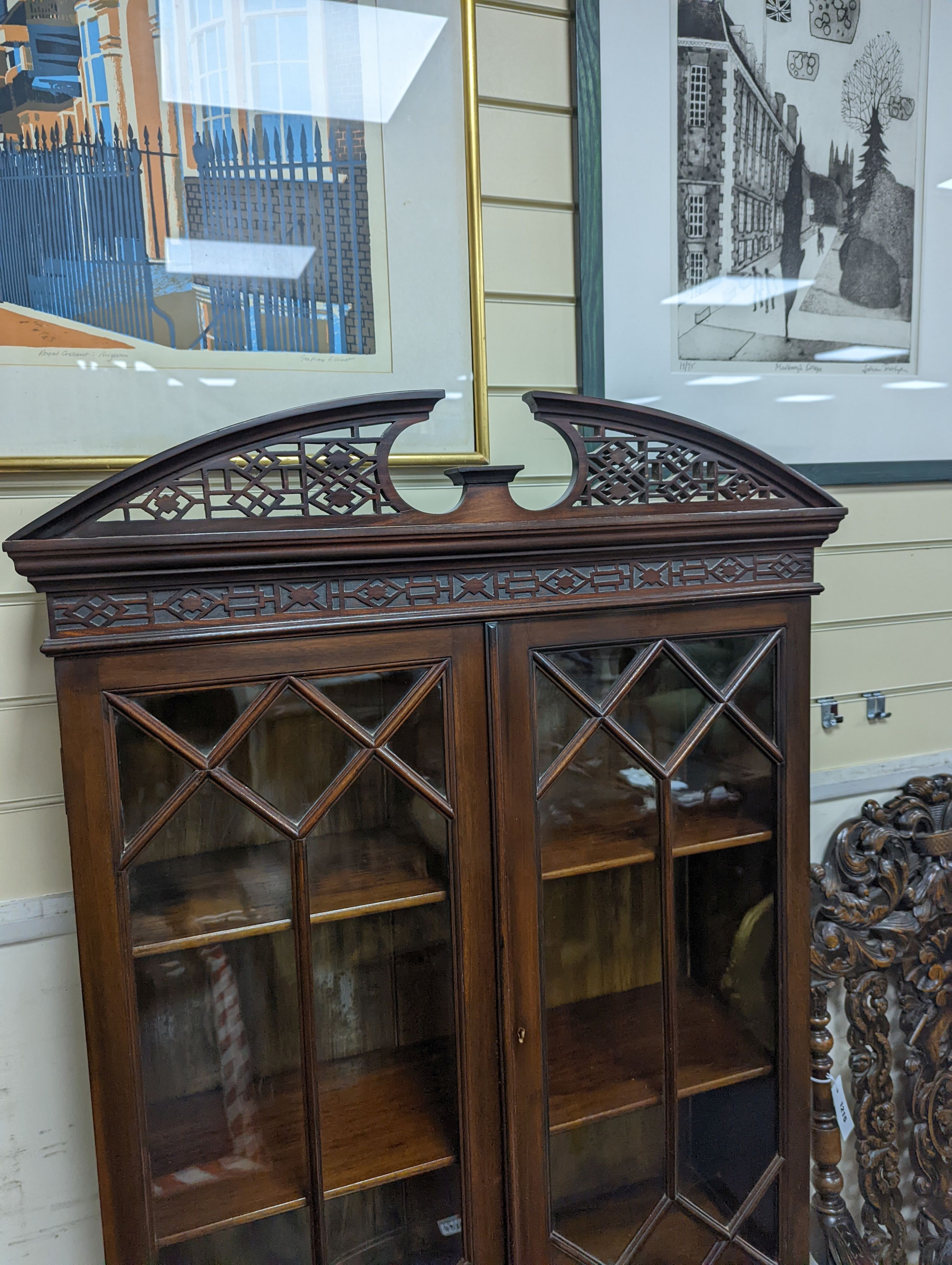 An Edwardian Chippendale revival serpentine mahogany display cabinet, width 76cm, depth 45cm, height 180cm